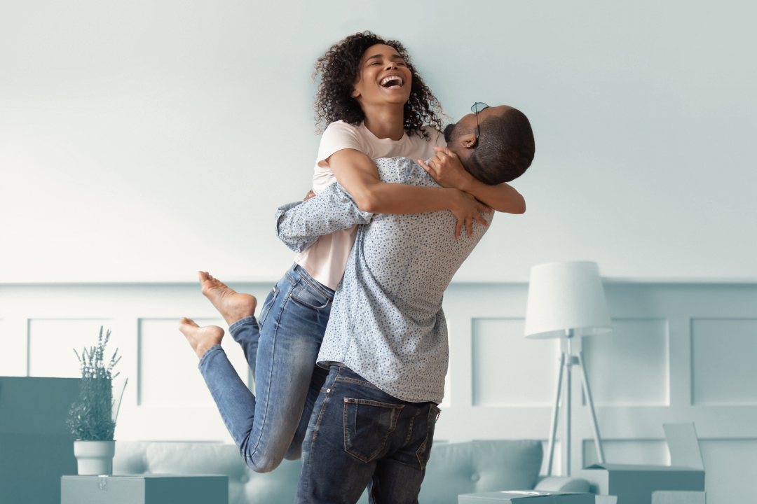 Man lifting woman